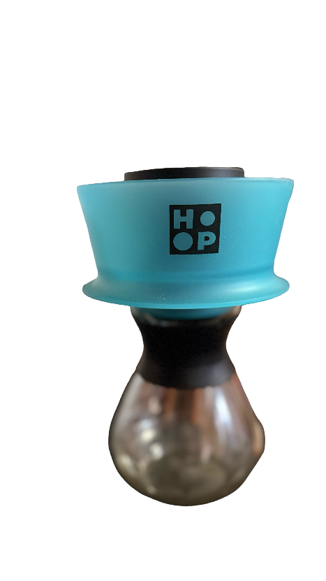Turquoise and black coffee filter with 'HOOP' branding on a white background